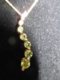 Gold peridot and diamond pendant from Atascadero Jewelry & Loan 202//269